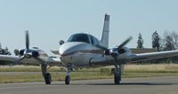 N1BF @ KRHV - A local 1973 Beechcraft Baron 55 taxing back to its hangar after an IFR flight from Palm Springs. Photo taken at Reid Hillview Airport, CA. - by Chris L.