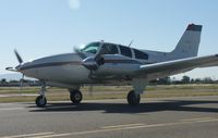 N1BF @ KRHV - A local 1973 Beechcraft Baron 55 taxing back to its hangar after an IFR flight from Palm Springs. Photo taken at Reid Hillview Airport, CA. - by Chris L.