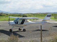 ZK-SAQ @ NZDA - view from side road at airfield - by magnaman