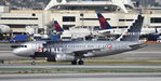 N528NK @ KLAX - Taxiing to gate at LAX - by Todd Royer