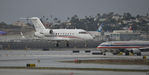 C-GAWH @ KLAX - Landing on 7R at LAX - by Todd Royer