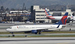 N380DA @ KLAX - Taxiing to gate at LAX - by Todd Royer