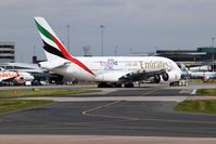 A6-EEL @ EGCC - being pushed back by an tug and soon will taxi out to the runway for take off on -05L - by andy-man-egcc