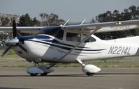 N2214L @ KRHV - Trade Wind's 2005 Cessna 182T taxing to transient parking to drop off some passengers. - by Chris L.