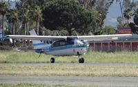 N761CF @ KRHV - A transient 1977 Cessna Turbo 210M taking off on runway 31R while a bird decides to join. - by Chris L.