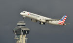 N103NN @ KLAX - Departing LAX on a stormy day - by Todd Royer