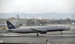 N566UW @ KLAX - Landing at LAX on 7R - by Todd Royer