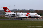 HB-JRB @ EGGW - REGA Swiss Air Ambulance - by Chris Hall