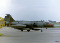 MM6932 @ EGXW - Taxy to static display area at RAF Waddington for the airshow 1997 - by Clive Pattle