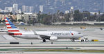 N924NN @ KLAX - Getting towed to gate - by Todd Royer
