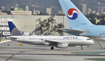 N484UA @ KLAX - Taxiing to gate at LAX - by Todd Royer