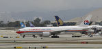 B-2078 @ KLAX - Taxiing at LAX - by Todd Royer