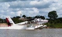 OB-1913-P - Taking off from the river near Iquitos - by confauna