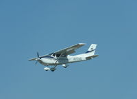 N2214L @ KRHV - A local 2005 Cessna 182T (Trade Winds Aviations, San Jose) landing on 31L at Reid Hillview Airport, CA. - by Chris Leipelt
