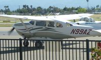 N99AZ @ KRHV - A transient 2006 Cessna T206H with a belly pack taxing out for departure at Reid Hillview Airport, CA after a football game. - by Chris Leipelt