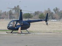 N233TR @ KTLR - Sierra Flite Robinson R44 II @ Mefford Field (Tulare, CA) for helicopter rides over the 2014 International Ag Expo - by Steve Nation