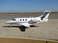 N300SL @ KPRB - Roll Global LLC (Los Angeles, CA) Raytheon 390 on executive terminal ramp @ Paso Robles Municipal Airport, CA - by Steve Nation