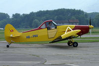 HB-PNV @ LSZL - waiting to cross the grass runway - by sparrow9