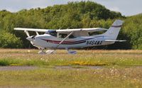 N464MA @ EGFH - Resident Cessna Skylane returning to base on Runway 22. - by Roger Winser