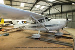 N104PF @ EGBG - inside the turntable hangar at Leicester - by Chris Hall