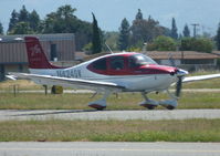 N424SW @ KRHV - A local Cirrus SR22 landing on runway 31R at Reid Hillview Airport, CA. - by Chris Leipelt