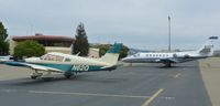 N62Q @ KRHV - A transient 1972 Piper Cherokee (LAFAYETTE, CA) visiting Reid Hillview Airport, CA. The Citation Ultra next to it makes the Piper look very very small! - by Chris Leipelt