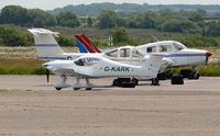 G-KARK @ EGFH - Visiting MCR-01 Club built from a kit by the owner. Dwarfed by two resident light aircraft.  - by Roger Winser