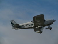 ZK-TZL @ NZNE - take off - by magnaman