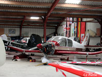 G-BAHL @ EGBR - Undergoing routine maintenance in a crowded hangar at Breighton EGBR - by Clive Pattle