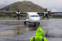 ZK-MVE @ NZQN - Arriving during heavy shower - by Micha Lueck