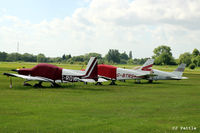 G-BTRS @ EGCB - In amongst a line-up in the GA park at Barton Airfield, Manchester - EGCB - by Clive Pattle