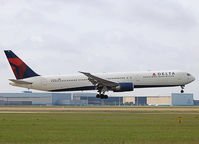 N838MH @ AMS - Landing on runway 27 of Schiphol Airport - by Willem Göebel