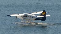 C-FIUZ @ CYHC - Harbour Air #306 taxiing for an early morning departure from Coal Harbour. - by M.L. Jacobs