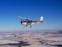 N4134F @ KBIE - Formation flight over Nebraska on a cold Novemeber day. - by Mark Gaffney