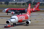 HS-ABB @ VTBD - AirAsia A320 pushed-back while another one taxyies past. - by FerryPNL