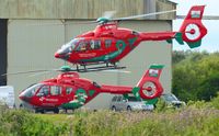 G-WASC @ EGFH - Visiting Wales Air Ambulance helicopter (Helimed 59) departing the South Wales Air Ambulance base with resident air ambulance helicopter (G-WASN Helimed 57) on the apron. - by Roger Winser