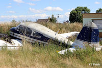 G-BICY @ EGSP - The grass is growing taller around the remains of this Apache at Sibson EGSP - by Clive Pattle