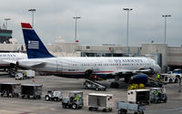 N664AW @ KCLT - At the gate CLT - by Ronald Barker