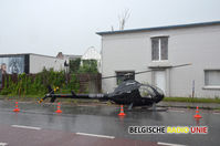 OO-153 - Friday afternoon 14 August in Kortrijk a helicopter on take-off from private land was in trouble. The helicopter gained little height and dropped down on the street. No one was injured. - by Speleers Nico - Belgische Radio Unie.net