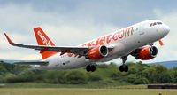 G-EZOH @ EGCC - Caught in action at Manchester Airport EGCC - by Clive Pattle