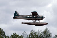 N73Q @ PLU - DeHavilland Beaver doing a flyby at Thun Field for Cubs and Classics. - by Eric Olsen