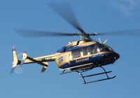 N933TG - Bell 407 at Heliexpo Orlando - by Florida Metal