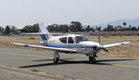 N4JY @ KRHV - A locally based 1976 Rockwell Commander 112TC taxing to its tie down at Reid Hillview Airport, CA. - by Chris Leipelt