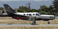 N900JV @ KRHV - Janzen Leasing LLC (Greenwood Village, CO) brand new 2014 Socata TBM-900 landing runway 31R at Reid Hillview Airport, San Jose, CA. - by Chris Leipelt