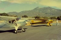 39246 @ CL35 - 246 with N39932 at Warner Springs gliderport. Wes (Northwest Pilot) singling me we are behind schedule and lets get moving. What is it with airline pilots and schedules anyway? - by S B J