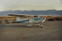N6369E @ L09 - 69E at Stove Pipe Wells airport with amazing Death Valley as a backdrop. Not a bad setting! - by S B J