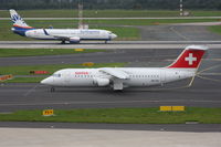 HB-IXO @ EDDL - HB-IXO taxiing with TC-SUY arriving - by Günter Reichwein