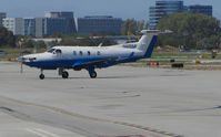 N805SA @ KSQL - Surf Air 2004 Pilatus PC-12/45 taxiis to ramp on arrival from KHHR (Hawthorne Airport, CA) @ San Carlos Airport, CA - by Steve Nation