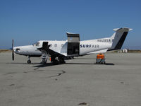 N828SA @ KSQL - Surf Airlines 2015 PC-12/47E on ramp @ San Carlos Airport, CA (SF Bay Area terminal) with cargo door open - by Steve Nation
