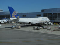 N180UA @ KSFO - United Airlines 1991 747-422 parked @ San Francisco International Airport Terminal 1 - by Steve Nation